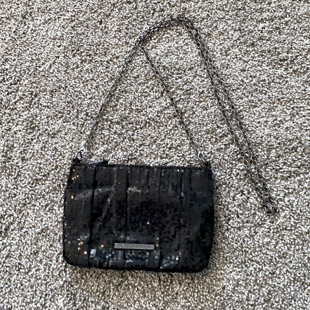 Small BCBG clutch with attachable strap